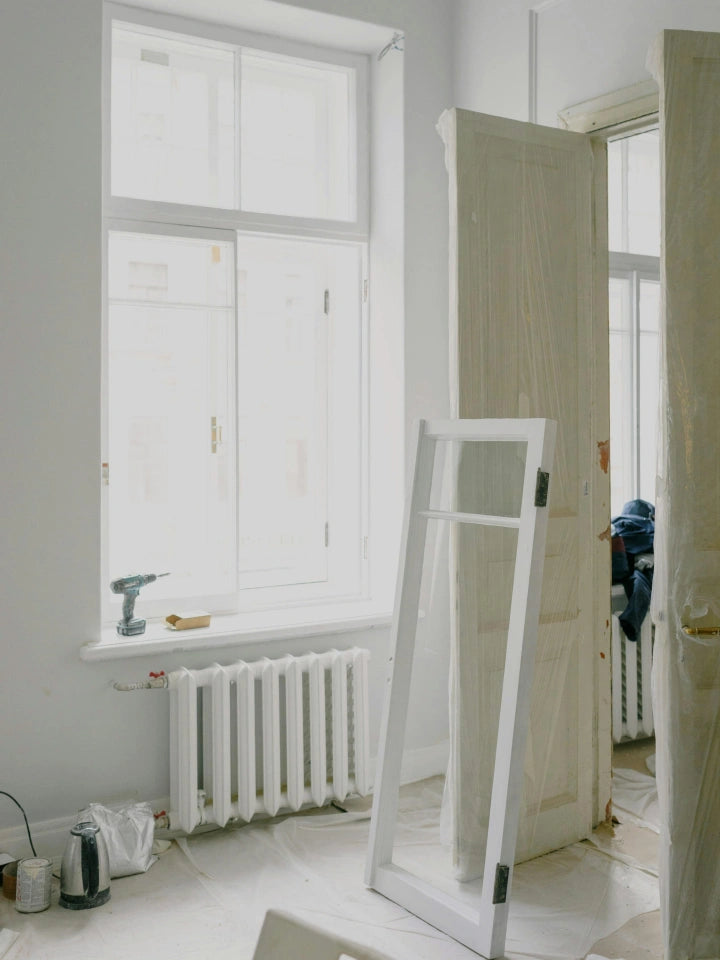 Furniture protected with plastic sheeting